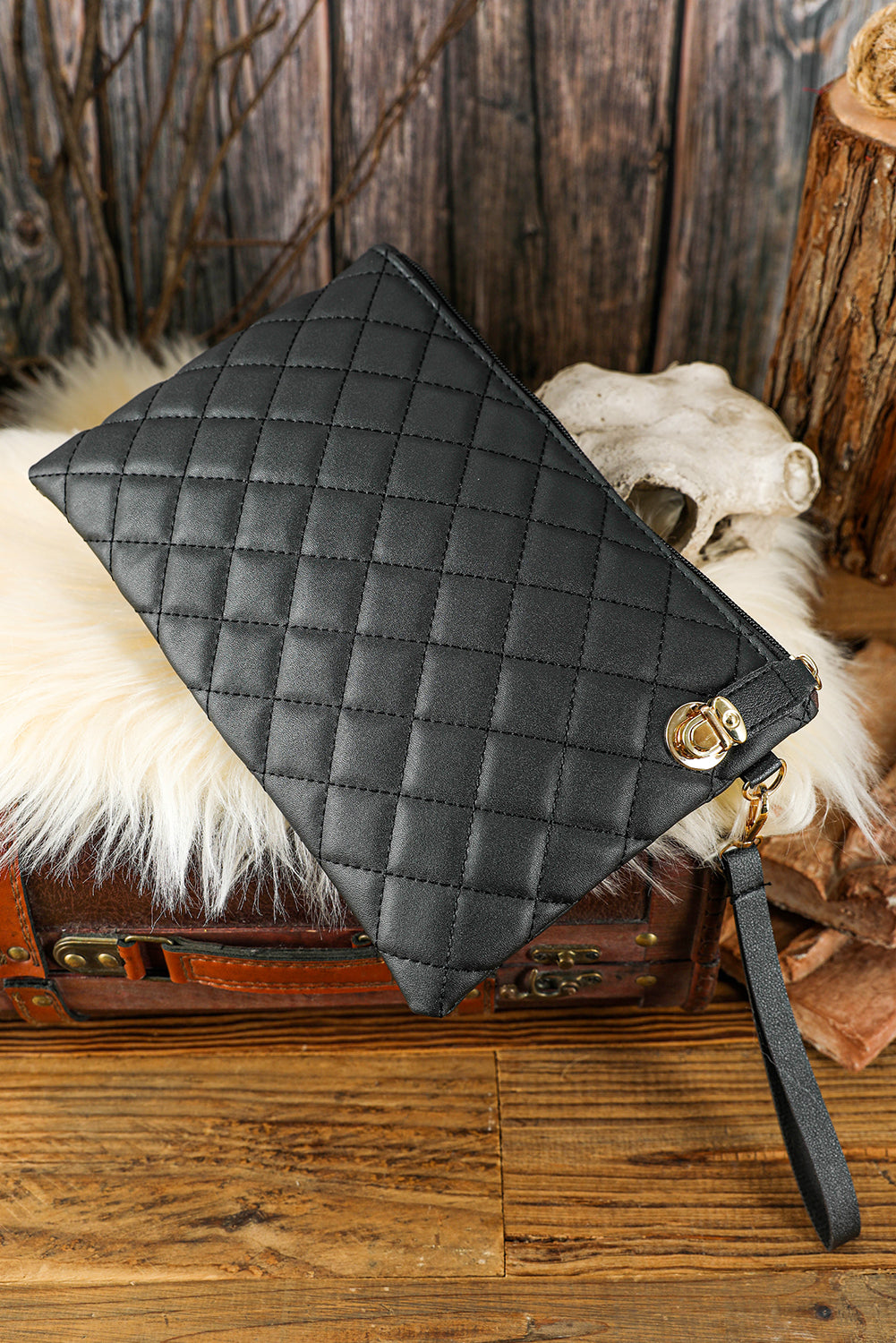 Black Quilted Leather Wrist Strap Clutch Bag