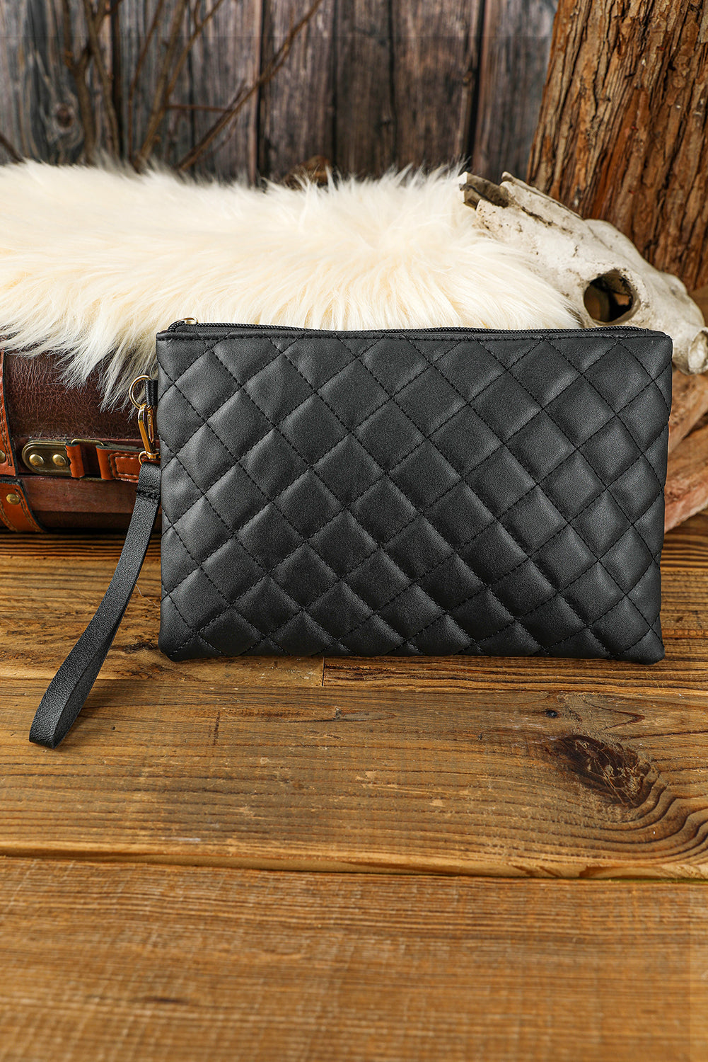 Black Quilted Leather Wrist Strap Clutch Bag